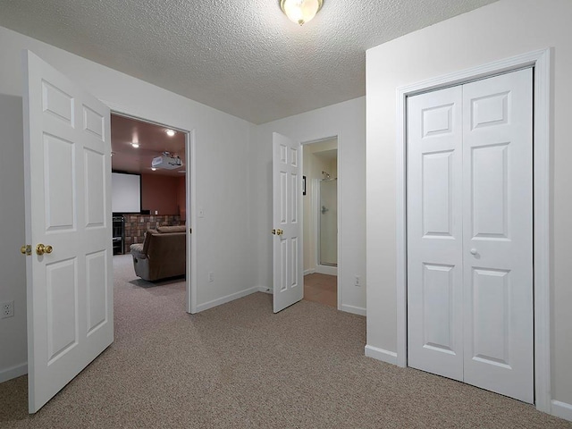 5 Glenn Eagles Vw, Hiram, GA 30141 - unfurnished bedroom with carpet flooring, a textured ceiling, and connected bathroom
