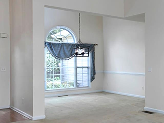 5 Glenn Eagles Vw, Hiram, GA 30141 - unfurnished dining area featuring a chandelier and carpet floors
