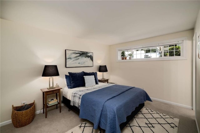 1445 Monroe Dr NE Unit C13, Atlanta, GA 30324 - bedroom with carpet flooring and baseboards