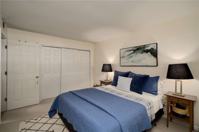 1445 Monroe Dr NE Unit C13, Atlanta, GA 30324 - bedroom featuring light carpet and a closet