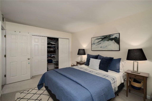 1445 Monroe Dr NE Unit C13, Atlanta, GA 30324 - bedroom with light colored carpet and a closet