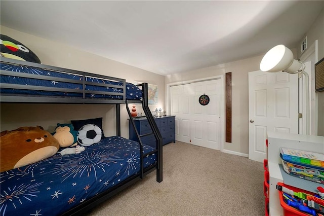 1445 Monroe Dr NE Unit C13, Atlanta, GA 30324 - bedroom featuring carpet and a closet