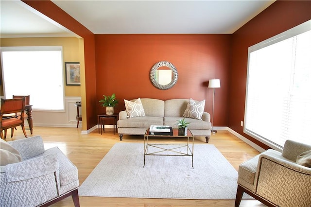 318 Ivy Manor Dr NW, Marietta, GA 30064 - living area with healthy amount of natural light, wood finished floors, and baseboards