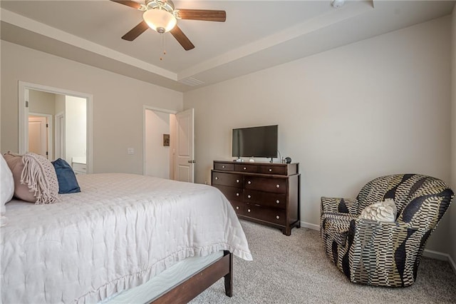 carpeted bedroom with a ceiling fan and baseboards