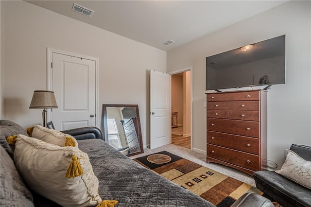 carpeted bedroom with baseboards