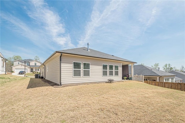 rear view of house with cooling unit