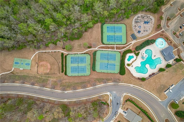 view of property location featuring a pool