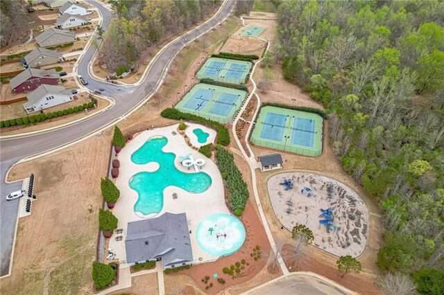 aerial overview of property's location featuring a pool area