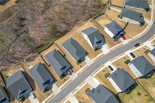 aerial view of property's location with nearby suburban area