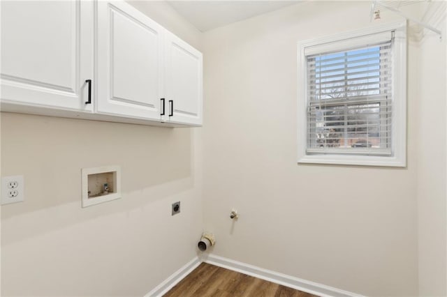 laundry area featuring cabinets, washer hookup, dark hardwood / wood-style floors, and hookup for an electric dryer