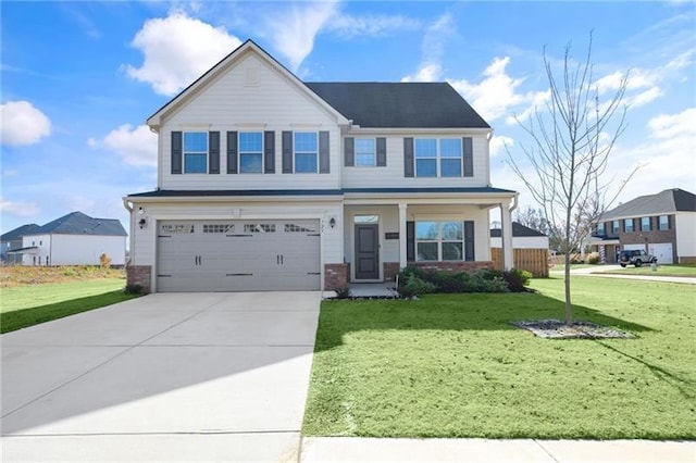 view of front of property featuring a garage and a front yard