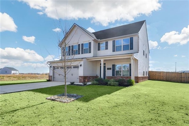 view of front of house featuring a garage and a front yard