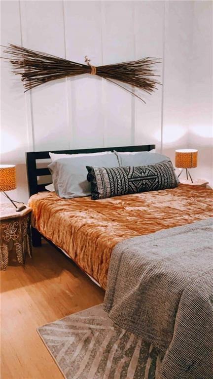 bedroom featuring hardwood / wood-style flooring