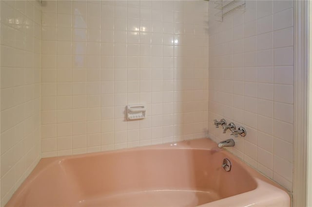 bathroom with a bathing tub