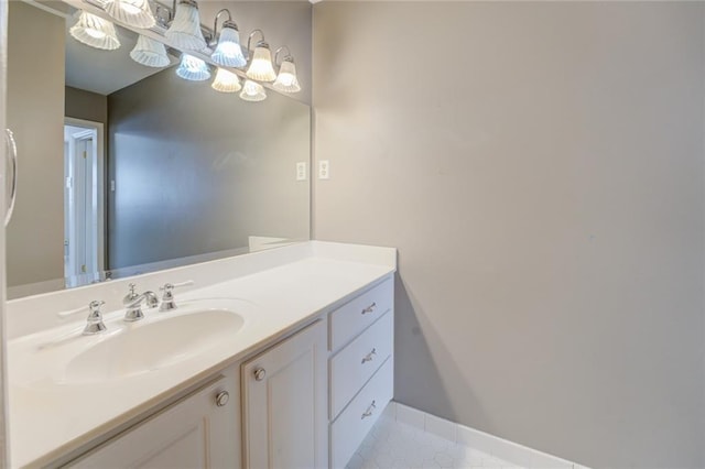 bathroom with tile patterned floors and vanity