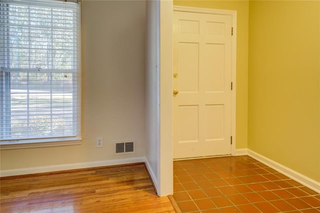 foyer with hardwood / wood-style flooring