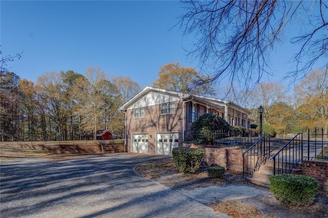 view of home's exterior with a garage