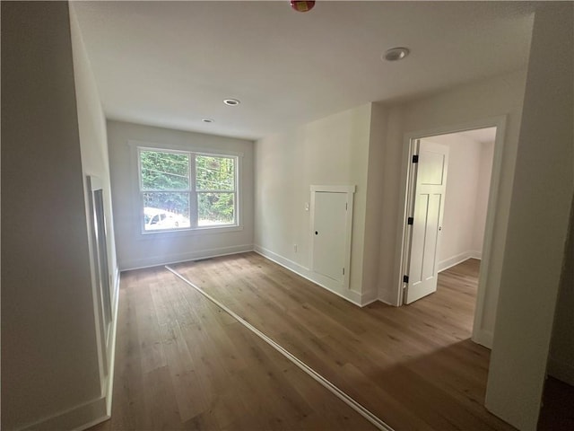 55 Noah Mountain Rd, Dahlonega, GA 30533 - spare room featuring wood finished floors, baseboards, and recessed lighting
