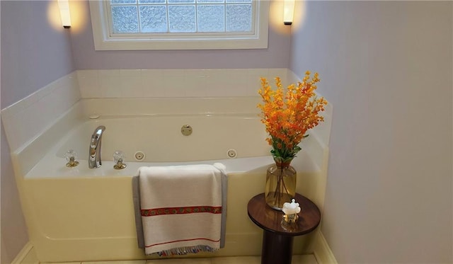 bathroom with a whirlpool tub