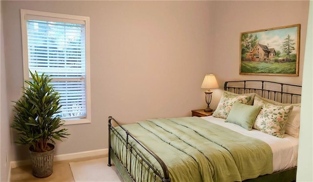 bedroom with light colored carpet