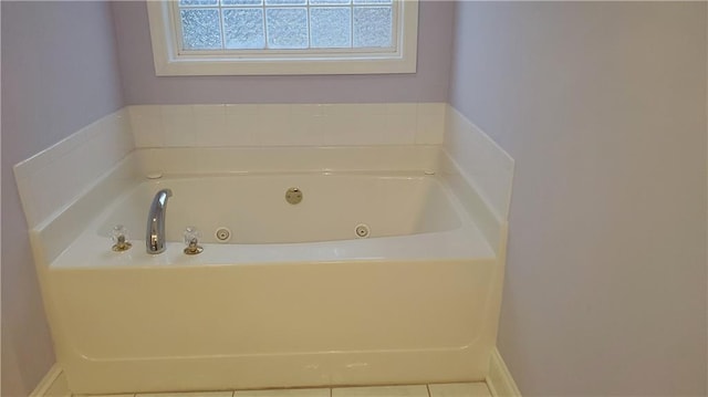 bathroom featuring a tub and tile patterned floors