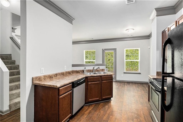 876 Ivydale Ln Unit 63, Lawrenceville, GA 30045 - kitchen featuring stainless steel appliances, crown molding, a sink, dark wood-style floors, and a peninsula