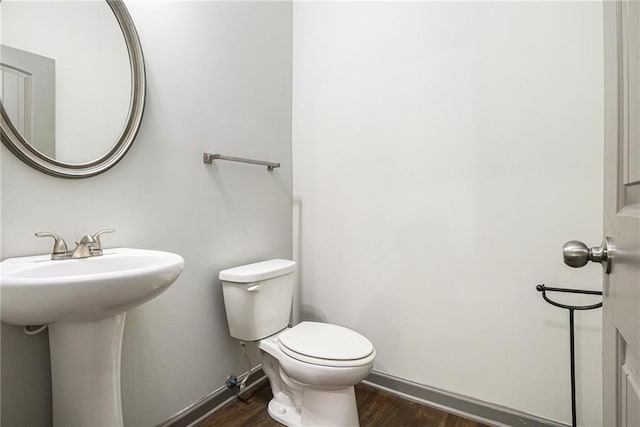 876 Ivydale Ln Unit 63, Lawrenceville, GA 30045 - bathroom featuring toilet, wood finished floors, baseboards, and a sink