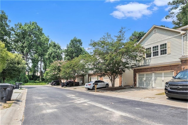 876 Ivydale Ln Unit 63, Lawrenceville, GA 30045 - view of asphalt street featuring curbs