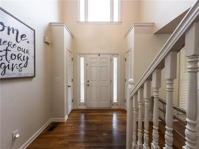 111 Bexley Ln, Douglasville, GA 30134 - foyer entrance featuring wood finished floors, baseboards, and a towering ceiling