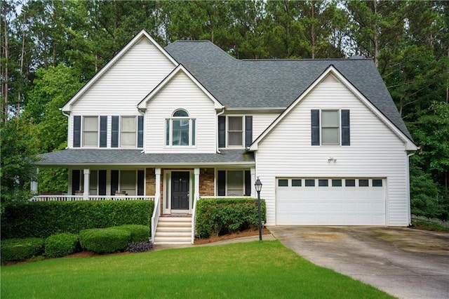 111 Bexley Ln, Douglasville, GA 30134 - view of front of house featuring a garage, driveway, a porch, a front lawn, and a shingled roof