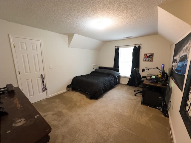 111 Bexley Ln, Douglasville, GA 30134 - carpeted bedroom featuring lofted ceiling, a textured ceiling, and baseboards