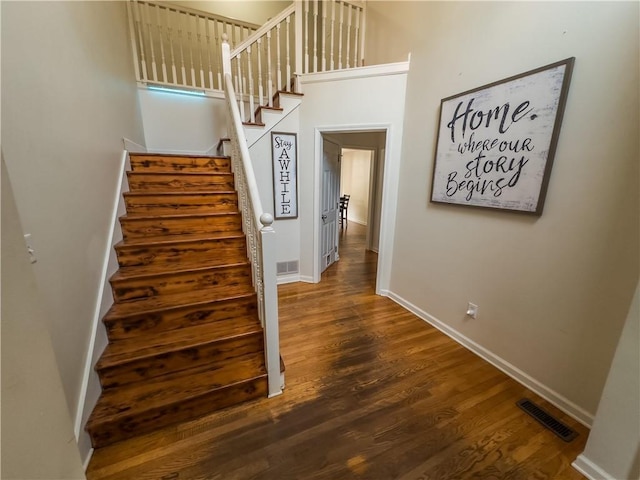 111 Bexley Ln, Douglasville, GA 30134 - stairs featuring wood finished floors and baseboards