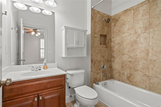 bathroom with ceiling fan, vanity, bathtub / shower combination, and toilet