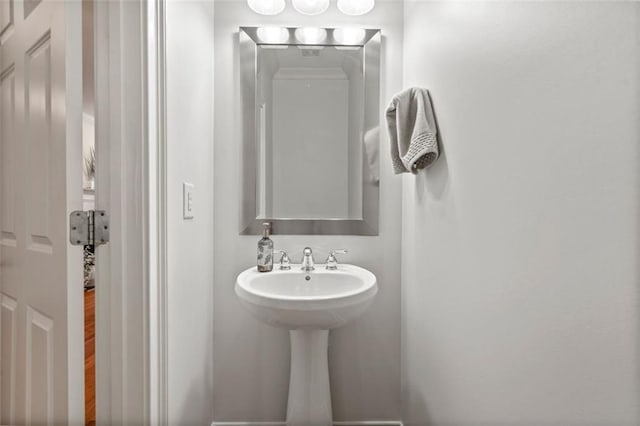 bathroom featuring wood finished floors