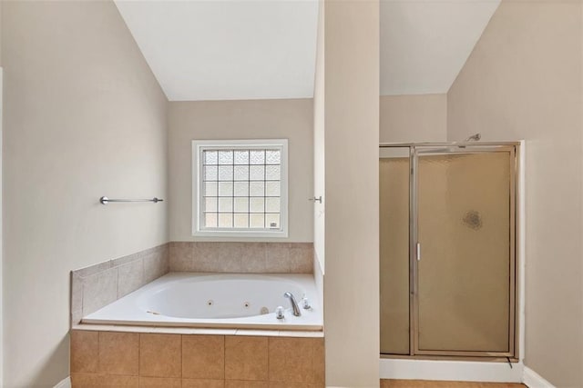 bathroom with separate shower and tub