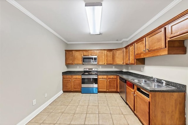 kitchen with light tile patterned flooring, ornamental molding, stainless steel appliances, and sink