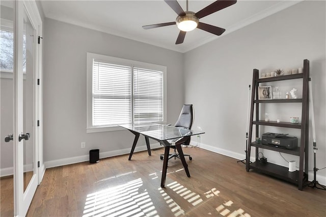 home office with hardwood / wood-style flooring, ornamental molding, and ceiling fan