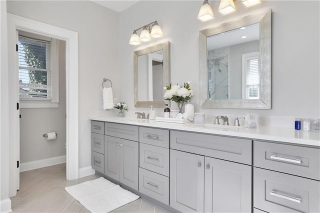 bathroom featuring double vanity