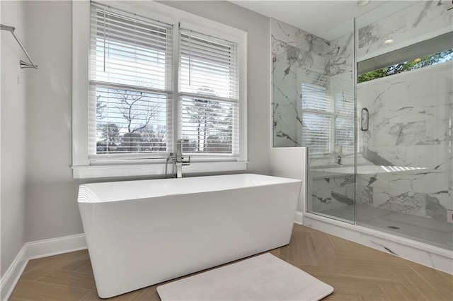 bathroom featuring independent shower and bath and parquet flooring