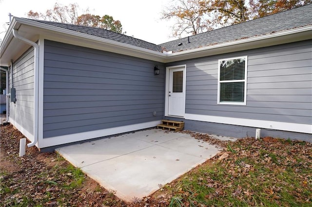 entrance to property with a patio area