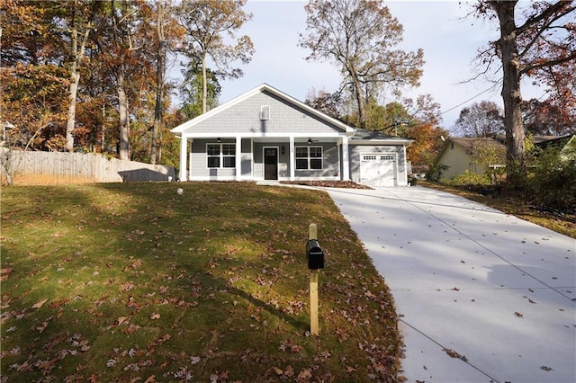 view of front facade with a garage and a front lawn