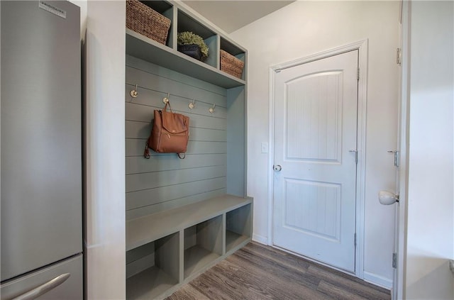 mudroom with dark wood-style floors