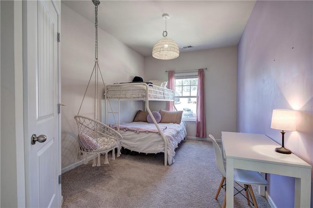 bedroom with visible vents, carpet flooring, and baseboards