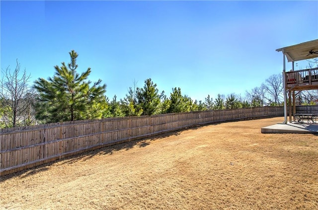 view of yard featuring a patio and a fenced backyard