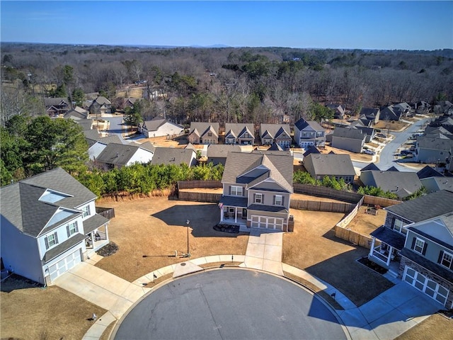 bird's eye view with a view of trees and a residential view