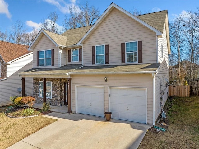 view of front of property featuring a garage