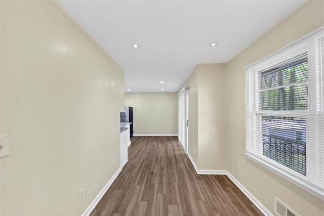 9258 Westview Dr SW, Covington, GA 30014 - hallway with baseboards, visible vents, wood finished floors, and recessed lighting