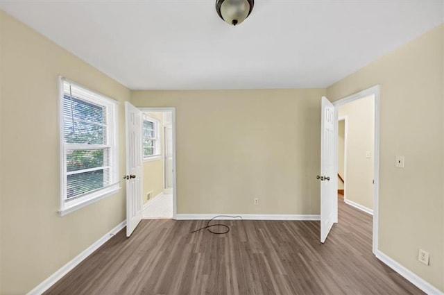 9258 Westview Dr SW, Covington, GA 30014 - spare room with baseboards and wood finished floors