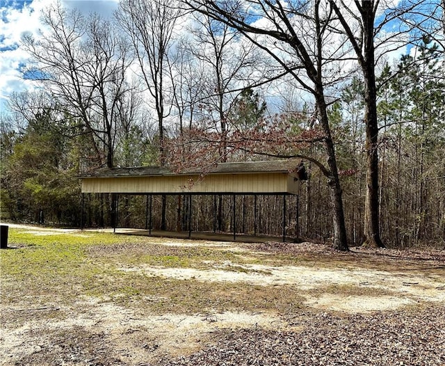 exterior space with a detached carport