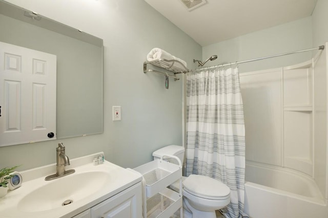 full bathroom with toilet, vanity, visible vents, and shower / tub combo with curtain